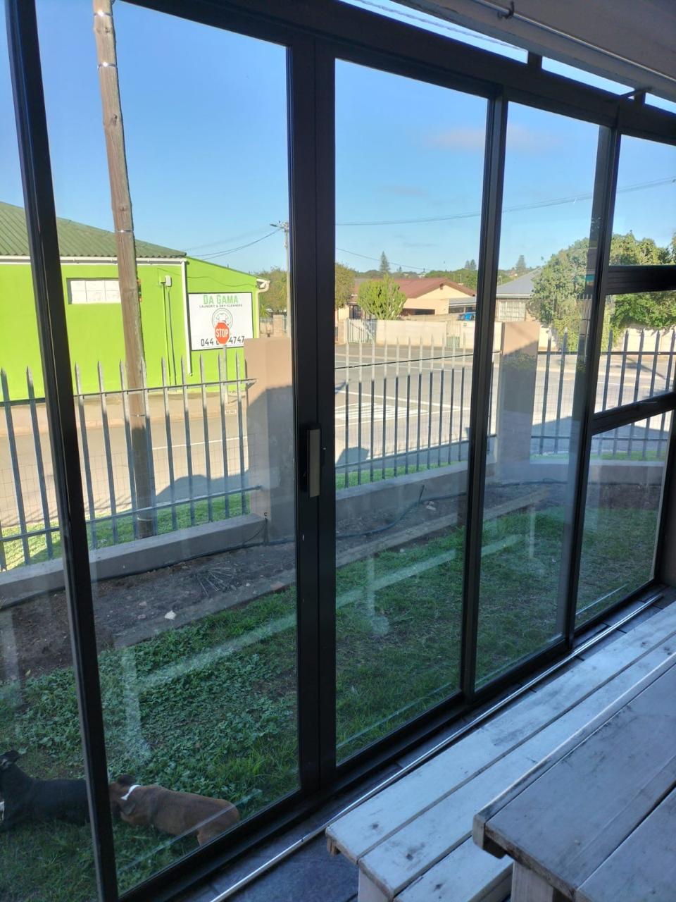 Enclosed veranda with large windows